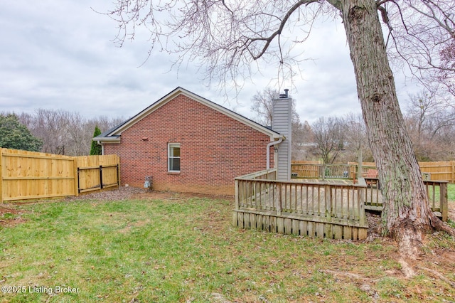 view of yard with a deck