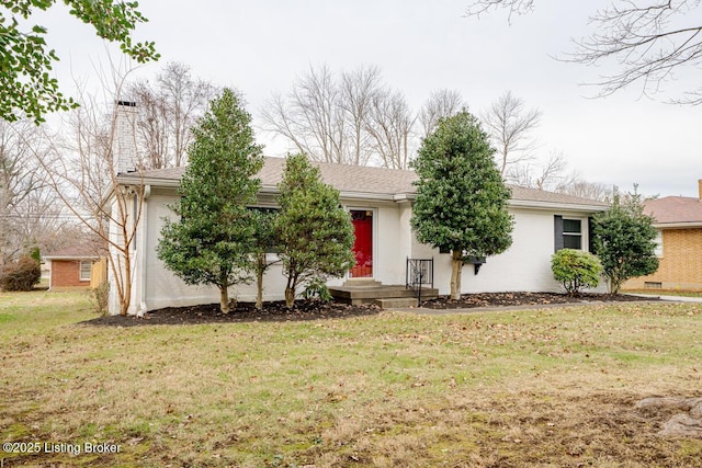 view of front of home featuring a front yard