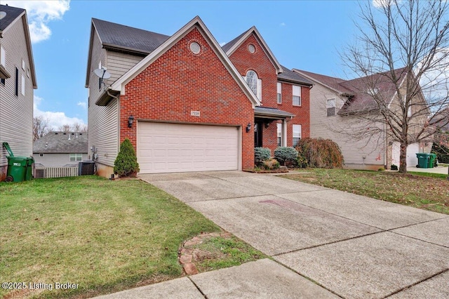 view of property featuring central AC, a garage, and a front lawn