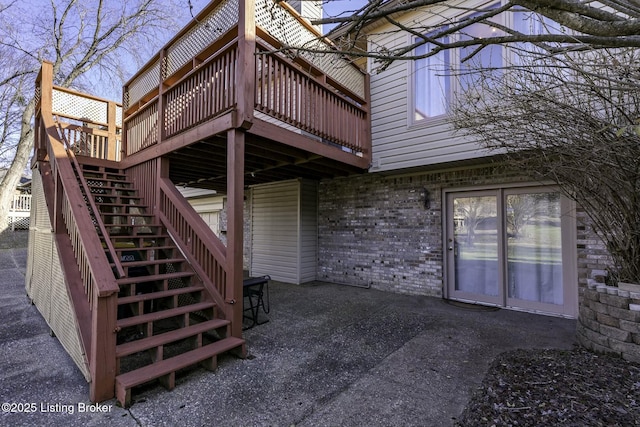 doorway to property featuring a patio area and a deck