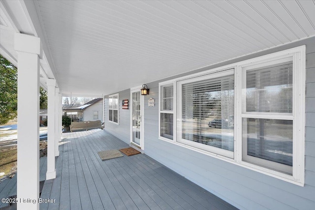 deck featuring covered porch