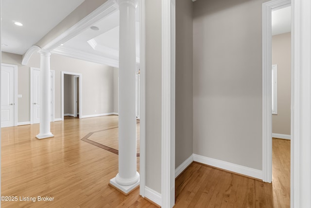 hall featuring crown molding and wood-type flooring