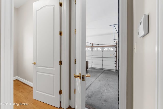 hallway featuring hardwood / wood-style floors