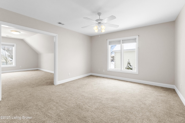 bonus room with carpet, ceiling fan, and lofted ceiling