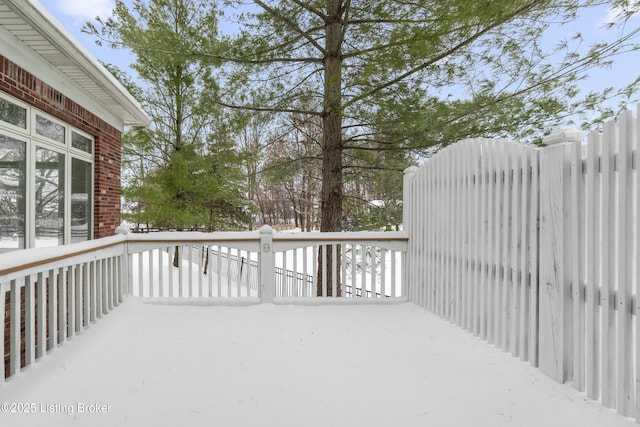 view of snow covered deck