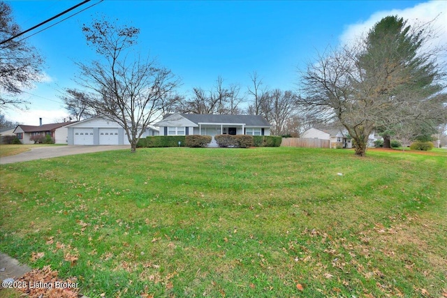 single story home featuring a front lawn and a garage