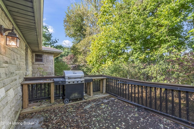 wooden deck with grilling area