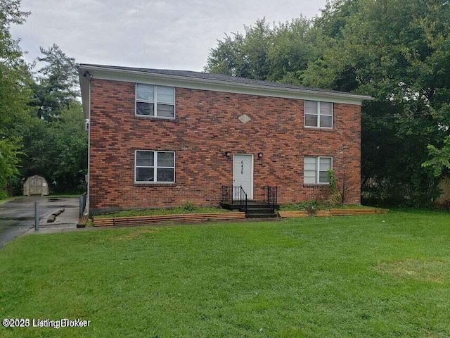 view of front of home with a front lawn