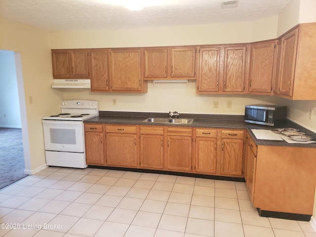 kitchen with sink, light tile patterned flooring, a textured ceiling, and white electric stove