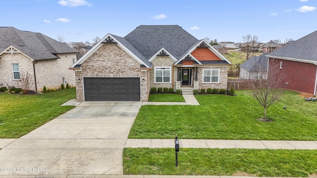 view of front facade featuring a garage and a front yard