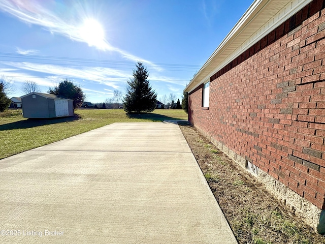 view of side of property with a yard