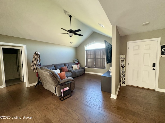 living room featuring ceiling fan, dark hardwood / wood-style floors, and lofted ceiling