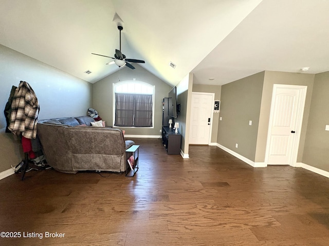 living room featuring dark hardwood / wood-style flooring, ceiling fan, and lofted ceiling