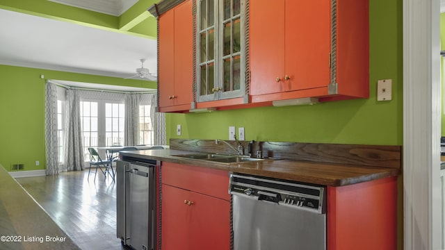 kitchen with dishwasher, french doors, sink, ceiling fan, and ornamental molding