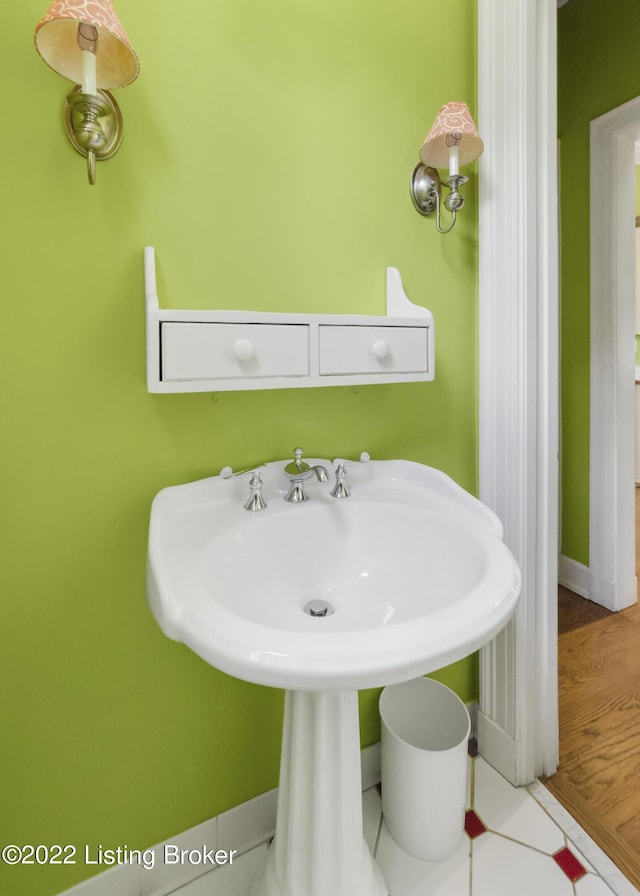 bathroom with tile patterned floors