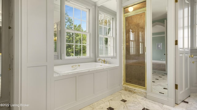 bathroom with separate shower and tub and tile patterned floors