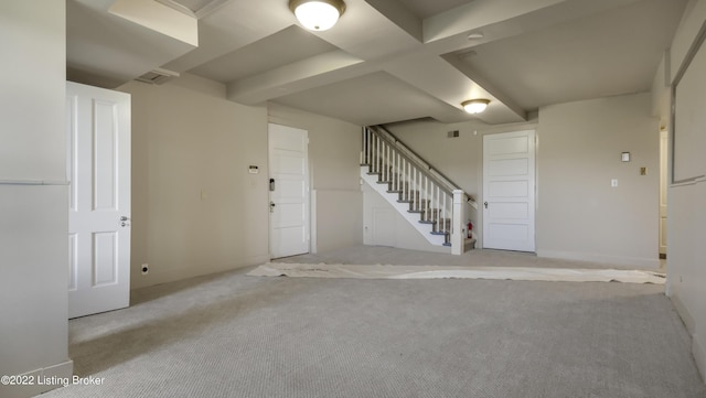 basement featuring light carpet