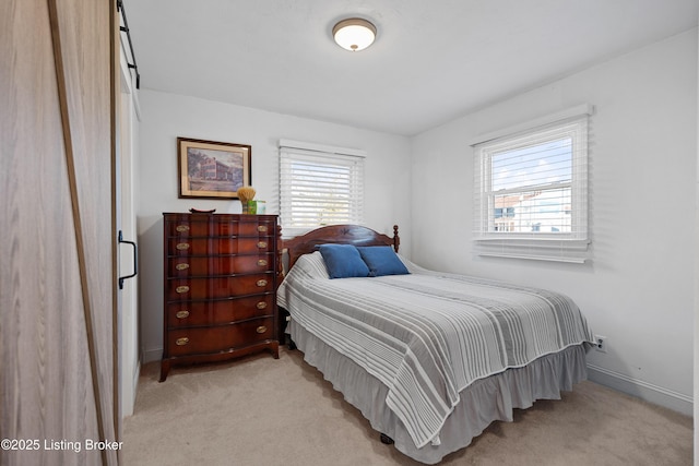 bedroom with light carpet