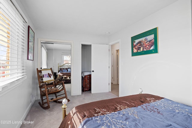 carpeted bedroom featuring a closet