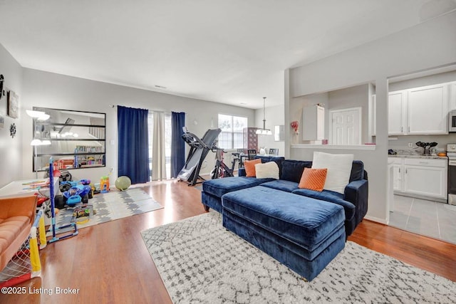 living room with light hardwood / wood-style floors