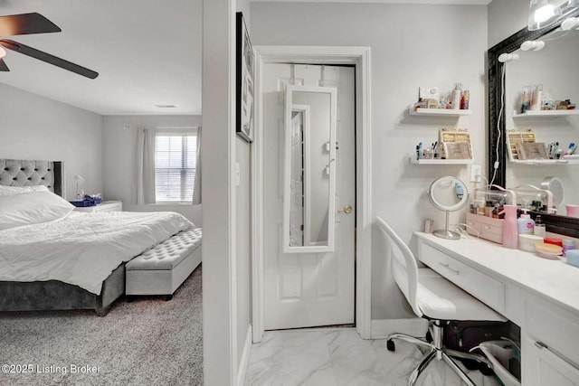 bedroom with ceiling fan and a closet