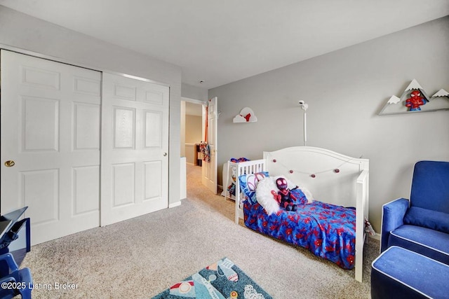 bedroom featuring carpet floors and a closet