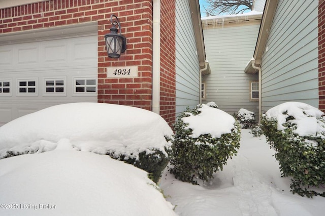 view of snow covered property