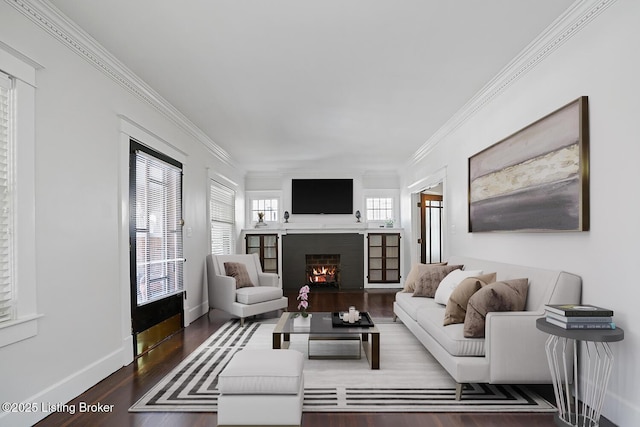 living room with ornamental molding and dark hardwood / wood-style flooring