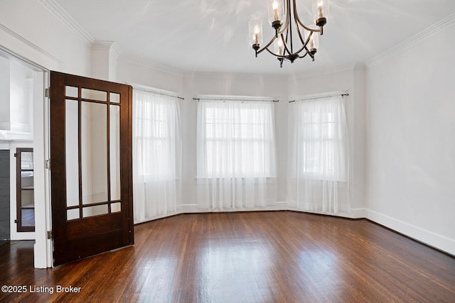 interior space featuring dark wood-type flooring, ornamental molding, and a healthy amount of sunlight