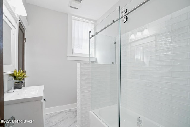 bathroom featuring vanity and enclosed tub / shower combo