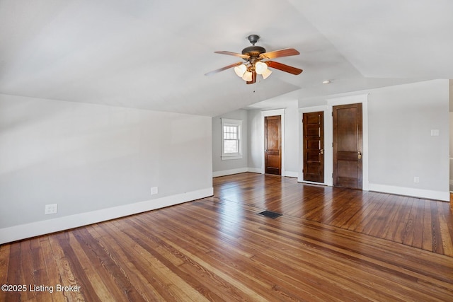 additional living space with lofted ceiling, wood-type flooring, and ceiling fan