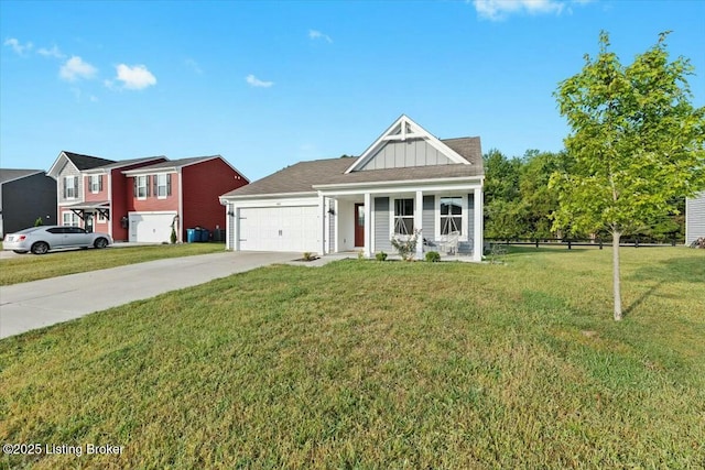 view of front of home with a garage, a porch, and a front yard