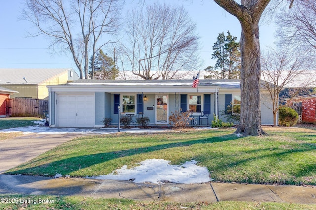 ranch-style home with a garage, covered porch, and a front yard