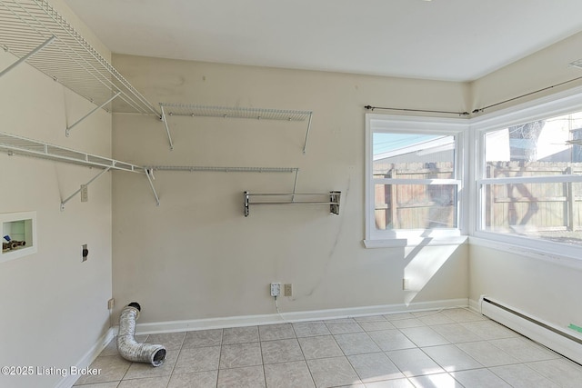 laundry room featuring light tile patterned flooring, hookup for an electric dryer, hookup for a washing machine, and a baseboard heating unit