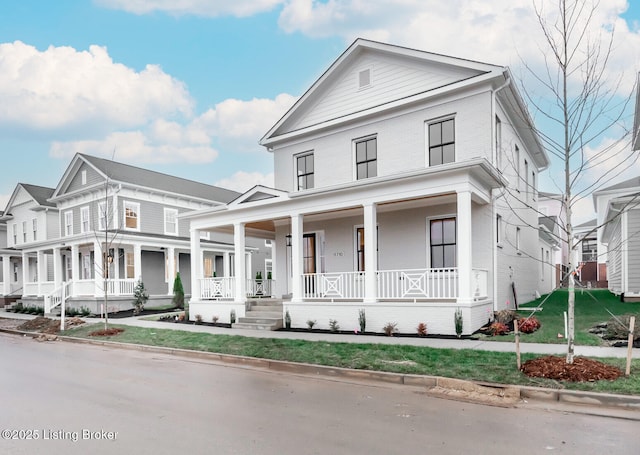 view of front of property featuring covered porch