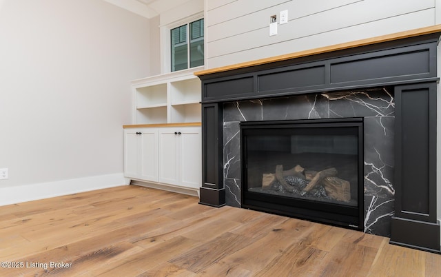 interior details with hardwood / wood-style flooring