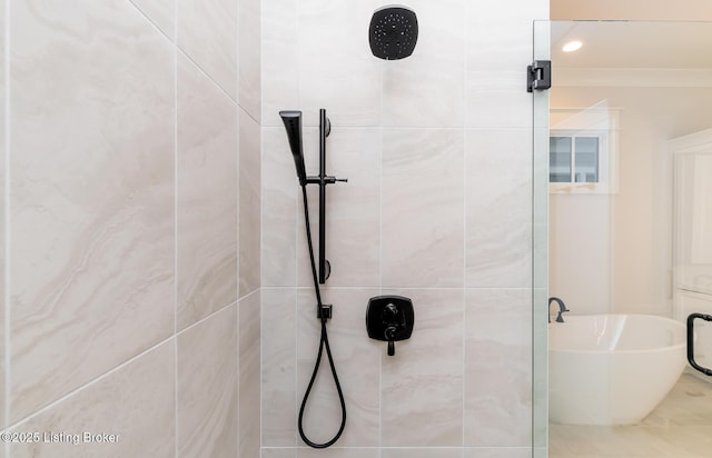 bathroom featuring separate shower and tub and crown molding