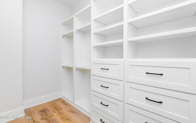 walk in closet featuring light wood-type flooring