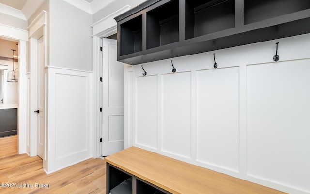 mudroom with hardwood / wood-style floors