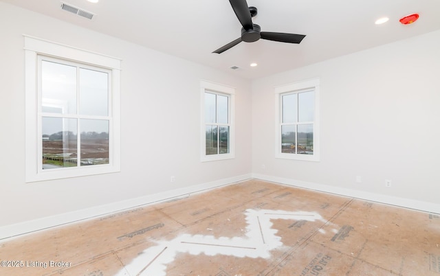 spare room with ceiling fan