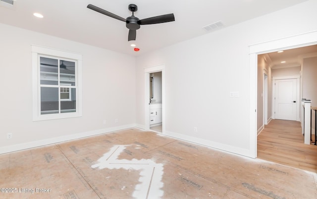 empty room featuring ceiling fan