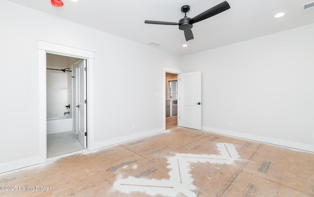 unfurnished bedroom featuring ceiling fan and ensuite bath