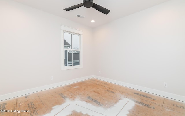 spare room with ceiling fan