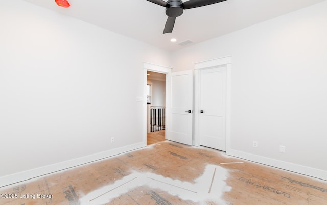 unfurnished bedroom featuring ceiling fan