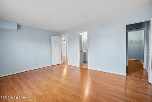 unfurnished room featuring light hardwood / wood-style floors