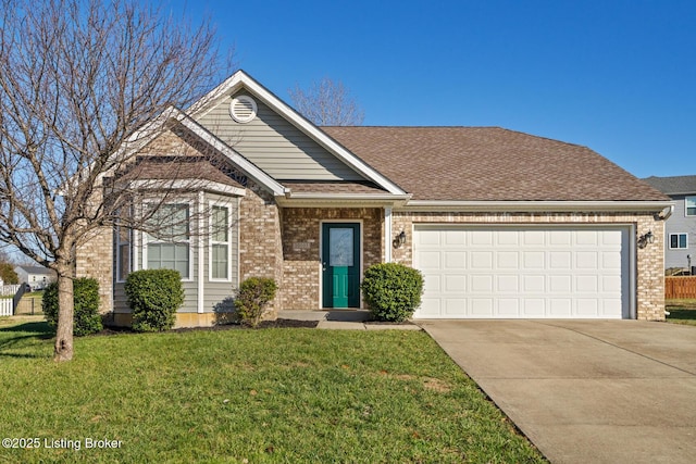 view of front of property featuring a front yard and a garage