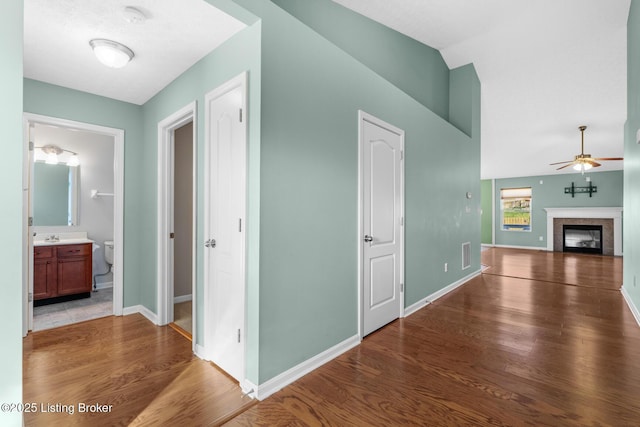 hall with dark hardwood / wood-style flooring