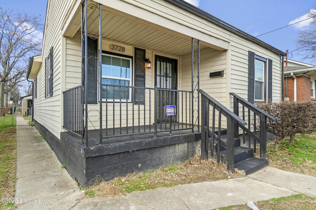 entrance to property with a porch