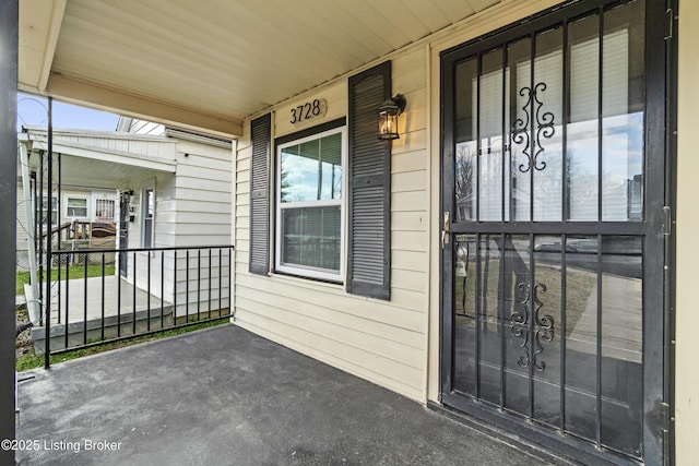 property entrance featuring covered porch