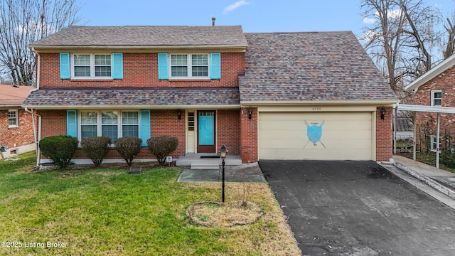 view of front property with a front yard and a garage